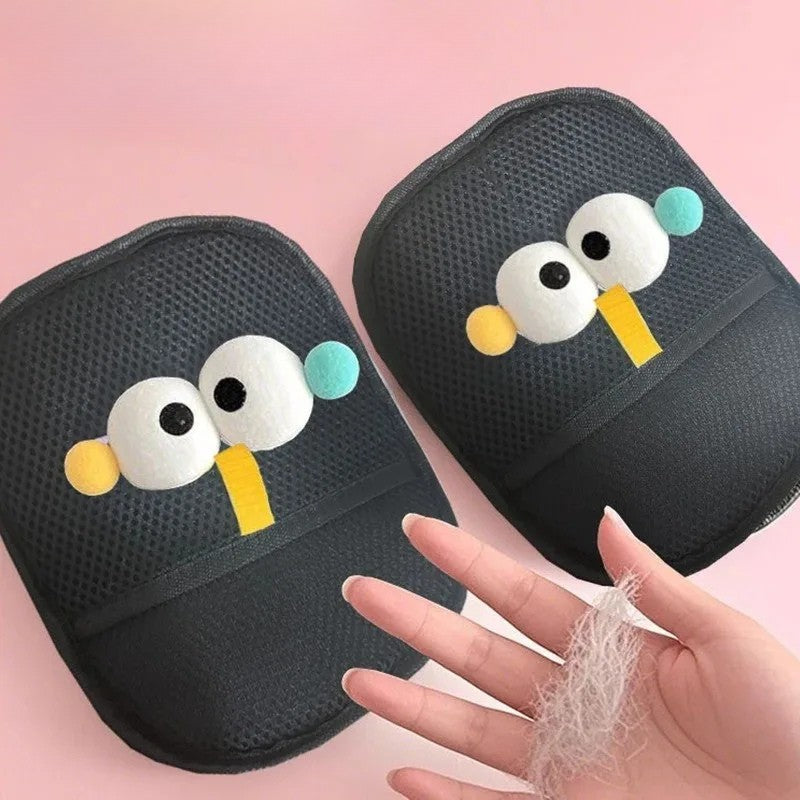 Two black cushion with cartoon face design on a pink background, showing hair removal results.