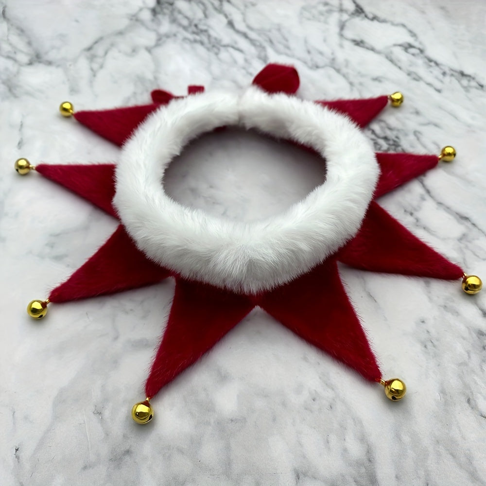 Decorative wreath with red felt and white fur center on a marble surface