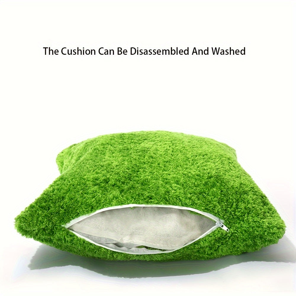 Green cushion with a zipper on a white background