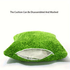 Green cushion with a zipper on a white background