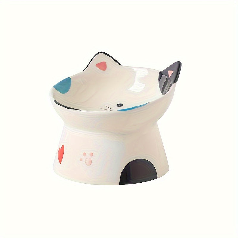 Ceramic cat-shaped bowl with colorful accents on a white background