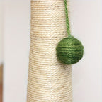 Cat scratch post with a green ball attachment on a white background