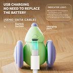 Green and purple device with USB charging cable on a wooden surface