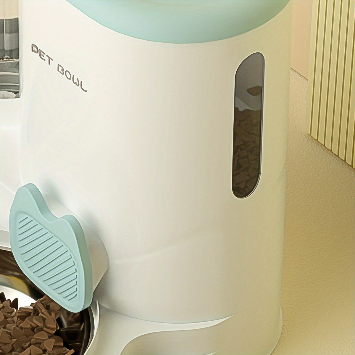 Pet food dispenser with a bowl of food on a light-colored surface