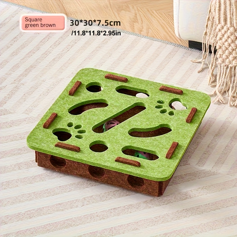 Green and brown pet puzzle toy on a striped surface