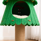 Green tree-shaped cat playhouse with a brown base on a white background
