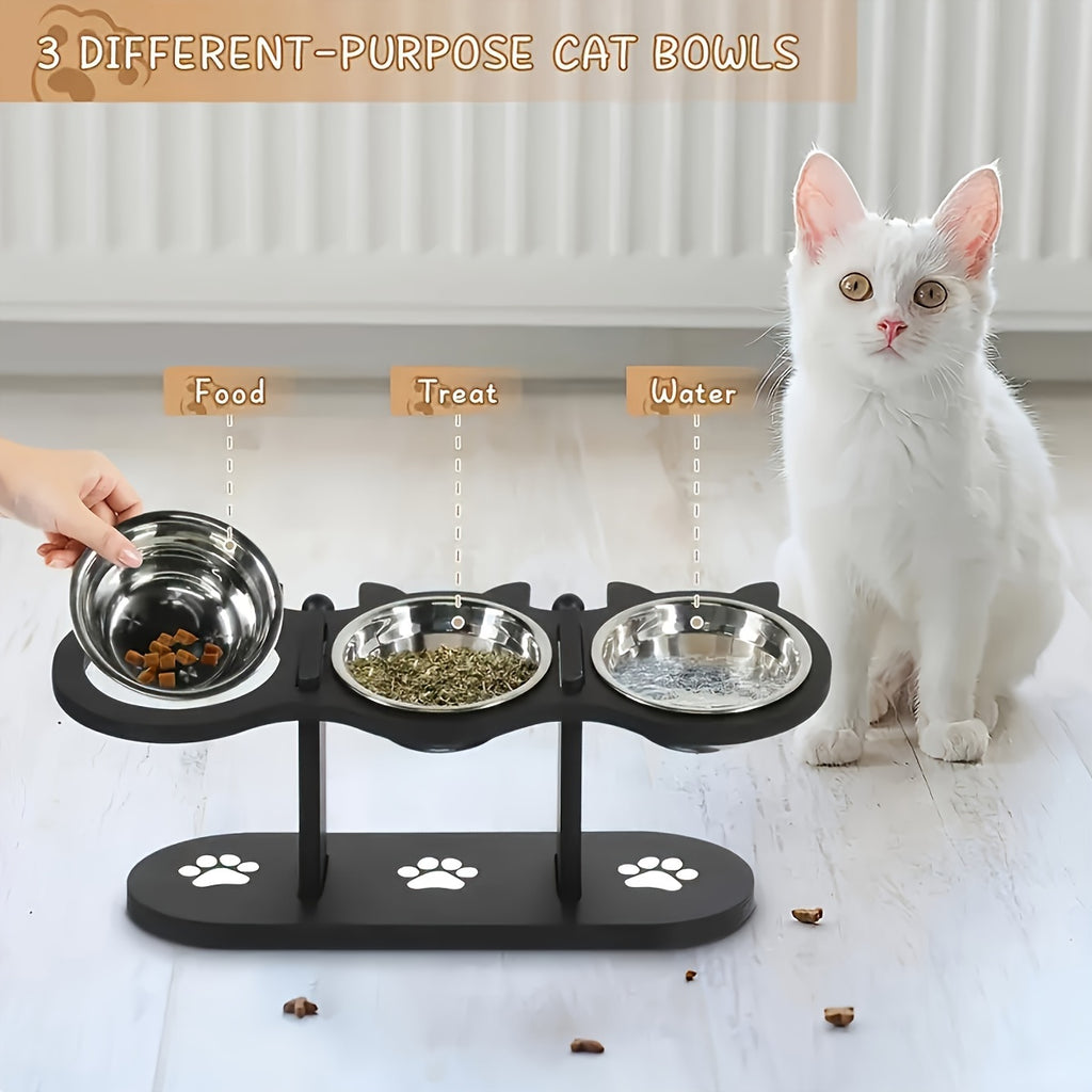 Cat sitting next to a three-tiered pet feeder with food, treat, and water bowls.
