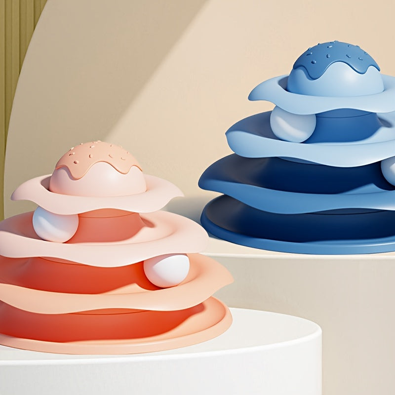 Two colorful toy structures, one pink and one blue, on a neutral background.