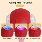 Red pet toy with light modes on a beige background