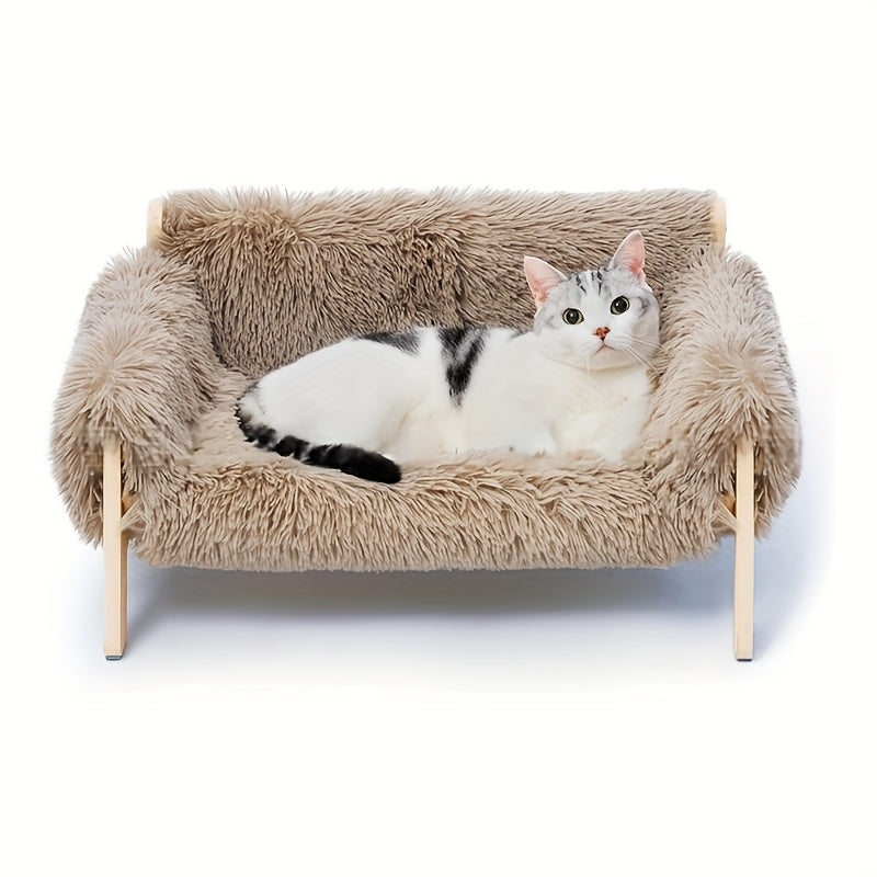 Cat lying on a fluffy pet bed with wooden frame on a white background