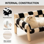 Cat lying on a checkered pet bed with labeled internal construction components.