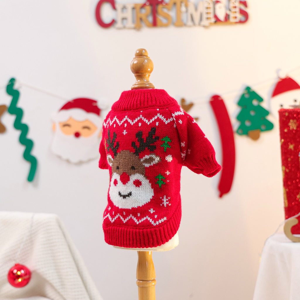 Red Christmas sweater with reindeer design on a mannequin against a festive background.