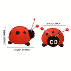 Two ladybug toys with measurements on a white background