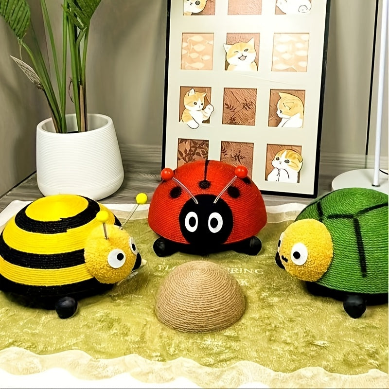 Three knitted ladybug, bee, and turtle toys on a textured surface with a framed picture in the background.