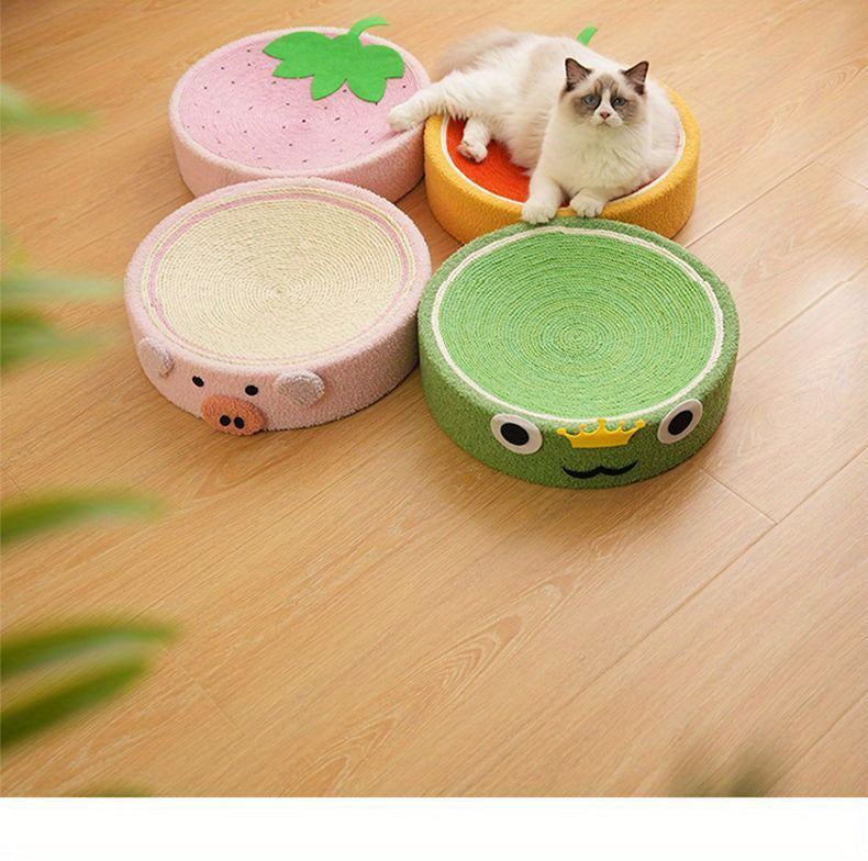 Four colorful cat beds shaped like animals on a wooden floor with a cat sitting on one of them.