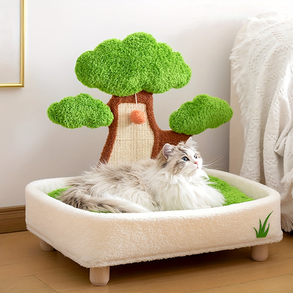 Cat lying on a tree-shaped pet bed with green grass and small trees.