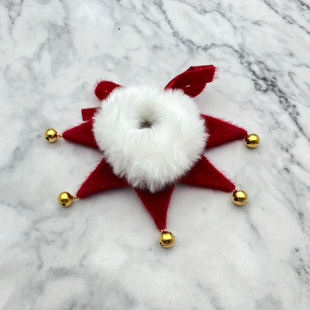 Red star-shaped decorative item with a white center and gold accents on a marble background
