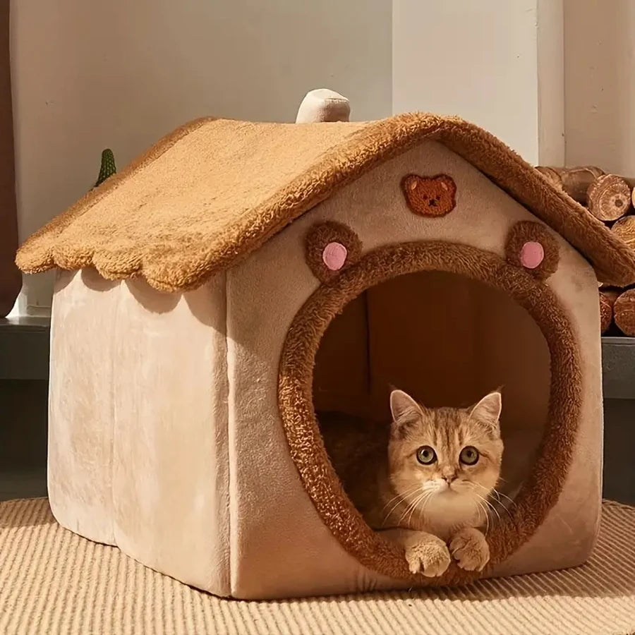 Cat peeking out from a cozy beige pet house with a brown roof.