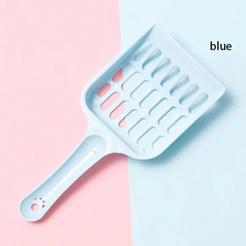 Blue pet grooming brush on a pink and blue background