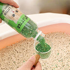 Person pouring green cat litter into a small container with a bottle labeled 'Litter Bees'.