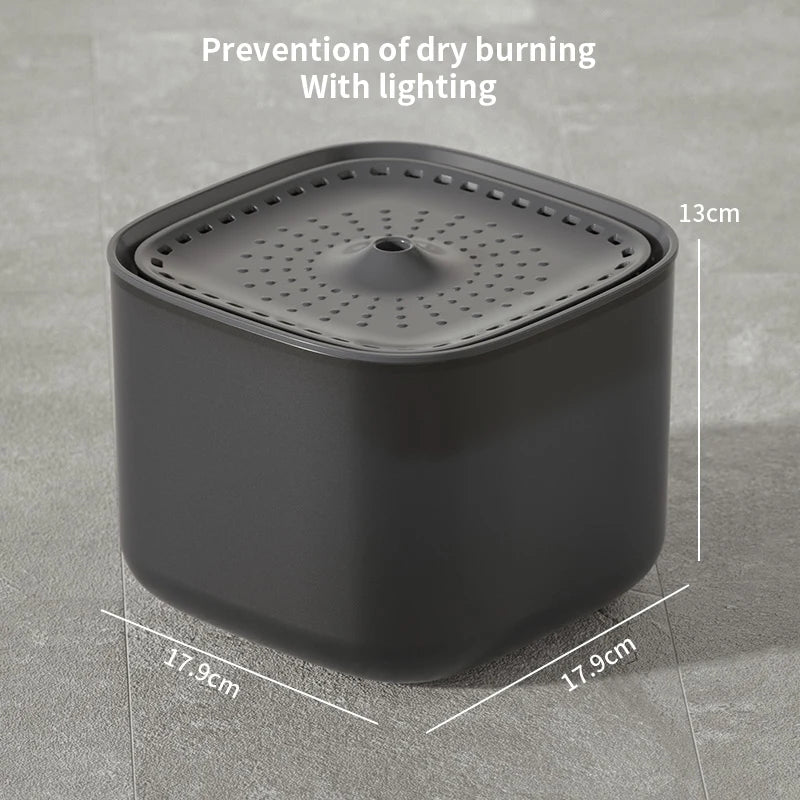 Black ceramic stove top with dimensions on a gray background