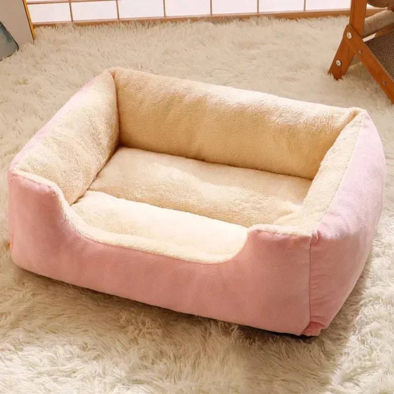 Pink and beige pet bed on a fluffy white rug