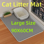 Cat litter mat with a cat litter box on top, placed on a wooden floor.