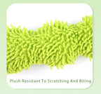 Green plush toy with text 'Plush Resistant To Scratching And Biting' on a light green background