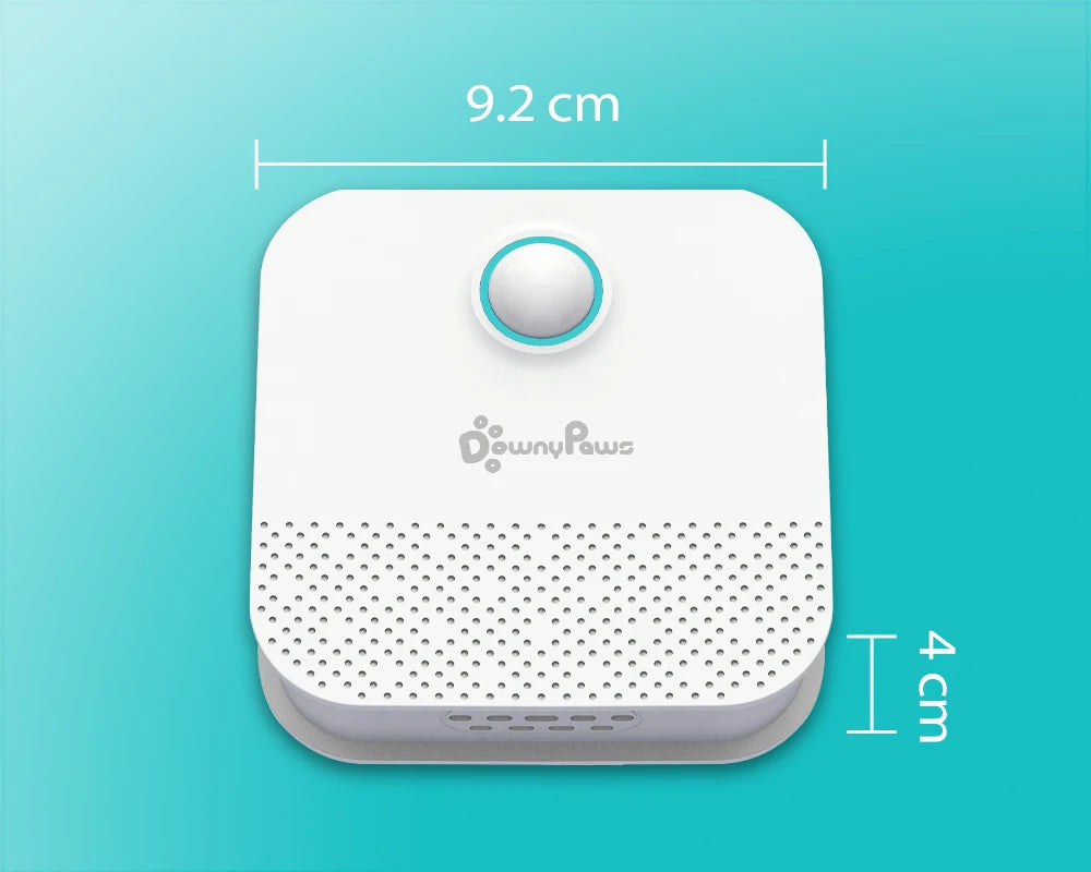 White electronic device with a circular button on a turquoise background, showing dimensions.