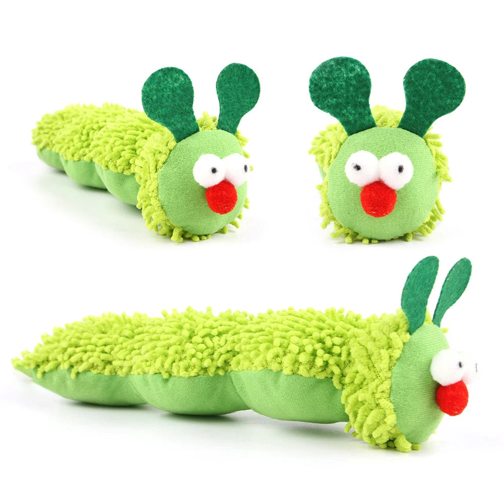 Green caterpillar plush toy with a face on a white background
