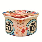 Colorful container with cat illustration and Japanese text on a white background
