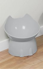 one grey cat bowl  on a wooden floor.