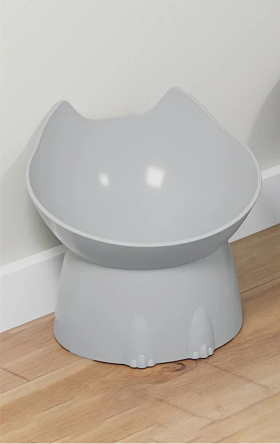 one grey cat bowl  on a wooden floor.