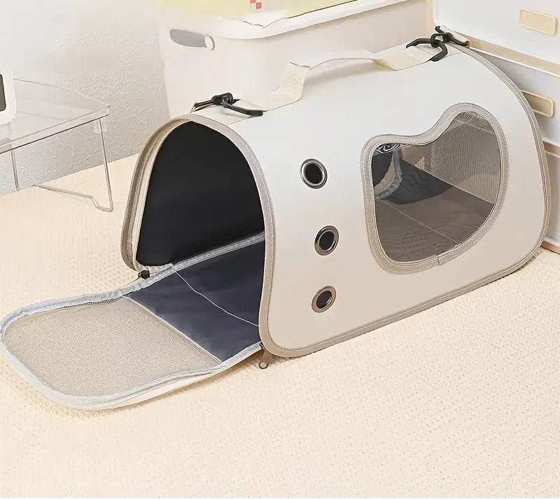 Pet carrier with clear window on a carpeted floor, featuring the HOMEFISH brand.