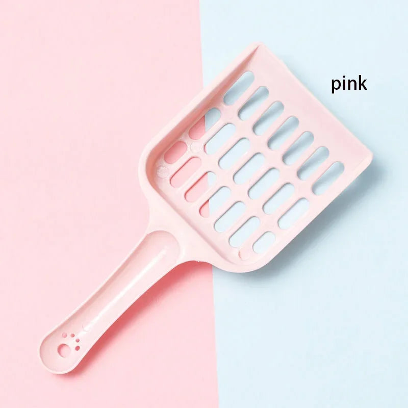 Pink pet grooming tool on a two-tone pink and blue background