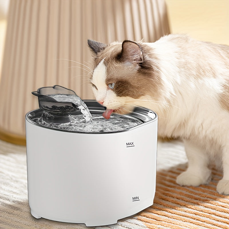 Cat drinking water from a pet fountain on a carpeted floor.
