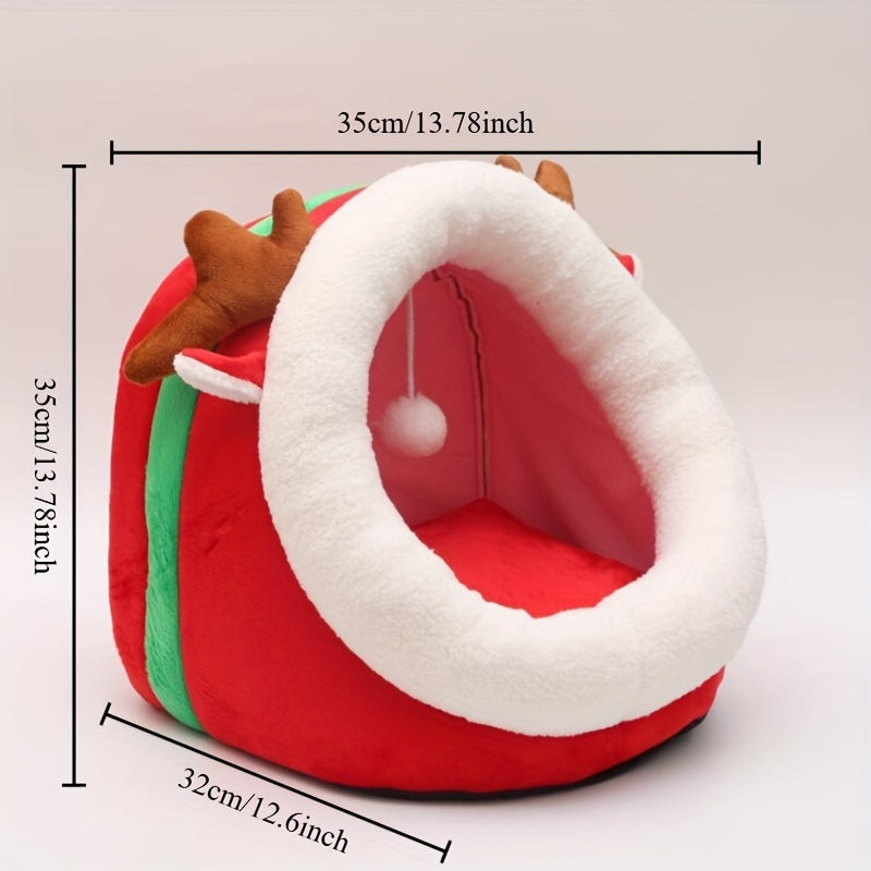 Red pet bed with reindeer antlers and measurements on a light gray background