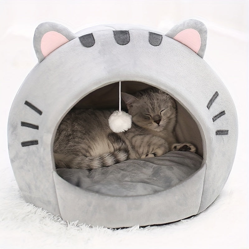Cat lying inside a gray pet bed with cat ears and stripes on a white background