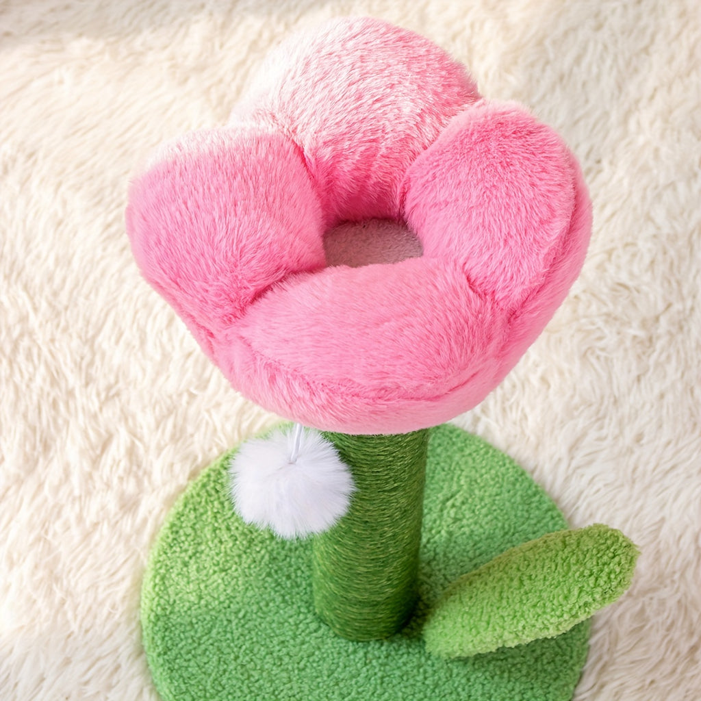 Pink plush flower toy on a textured surface