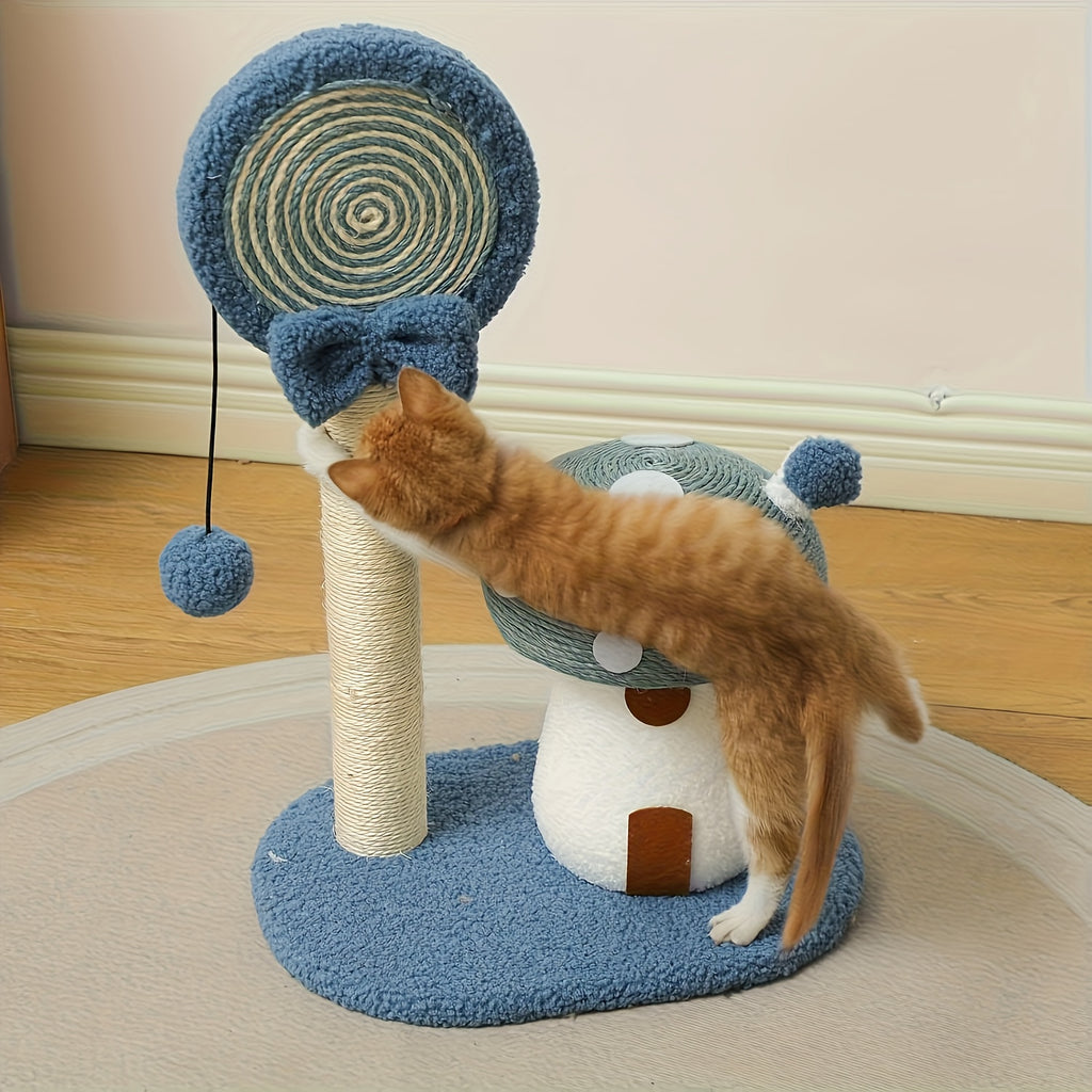 Cat playing with a blue and white cat tree on a wooden floor.