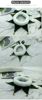 Decorative wreath with green leaves and gold accents on a marble surface