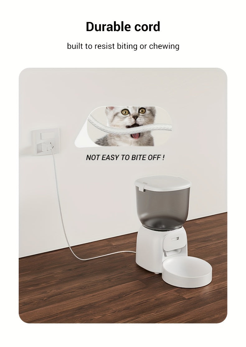 White pet feeder with durable cord on a wooden floor, featuring a cat illustration.