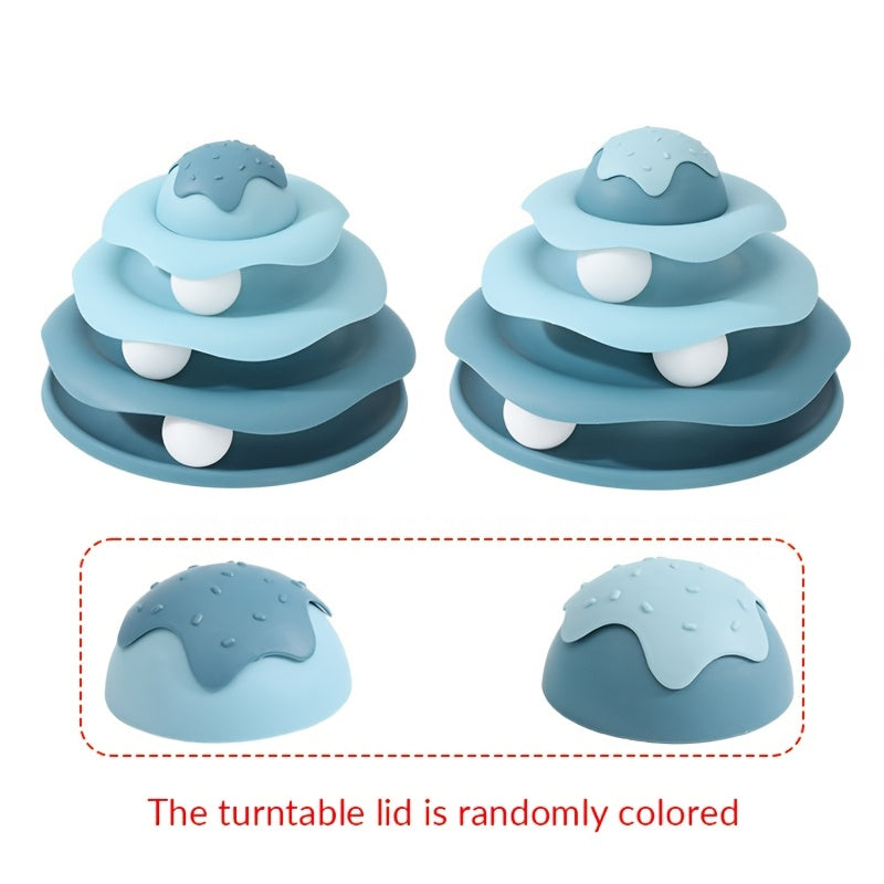 Two blue tiered toys with a turntable lid on a white background