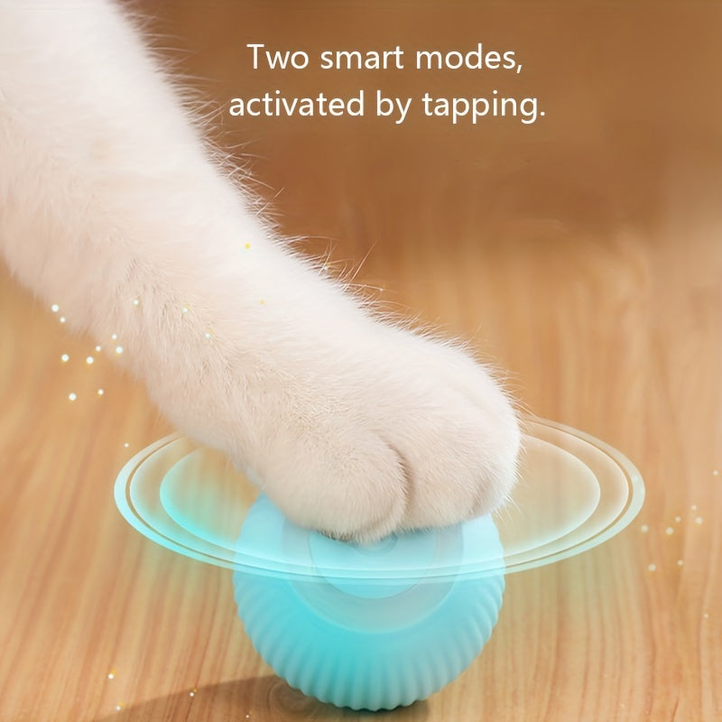 Cat paw interacting with a blue and clear silicone ball on a wooden surface, with text about smart modes.