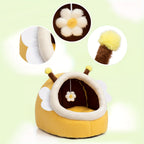 Pet bed designed like a bee with flower and antenna details on a light green background.