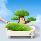 Tree-shaped pet bed with a plush tree design on a blue sky background