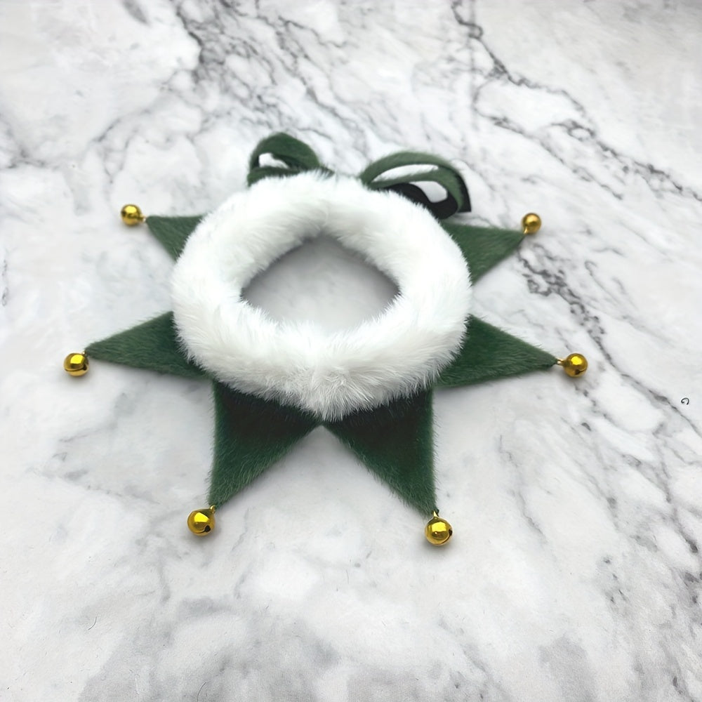 Green decorative wreath with white center and gold balls on a marble surface