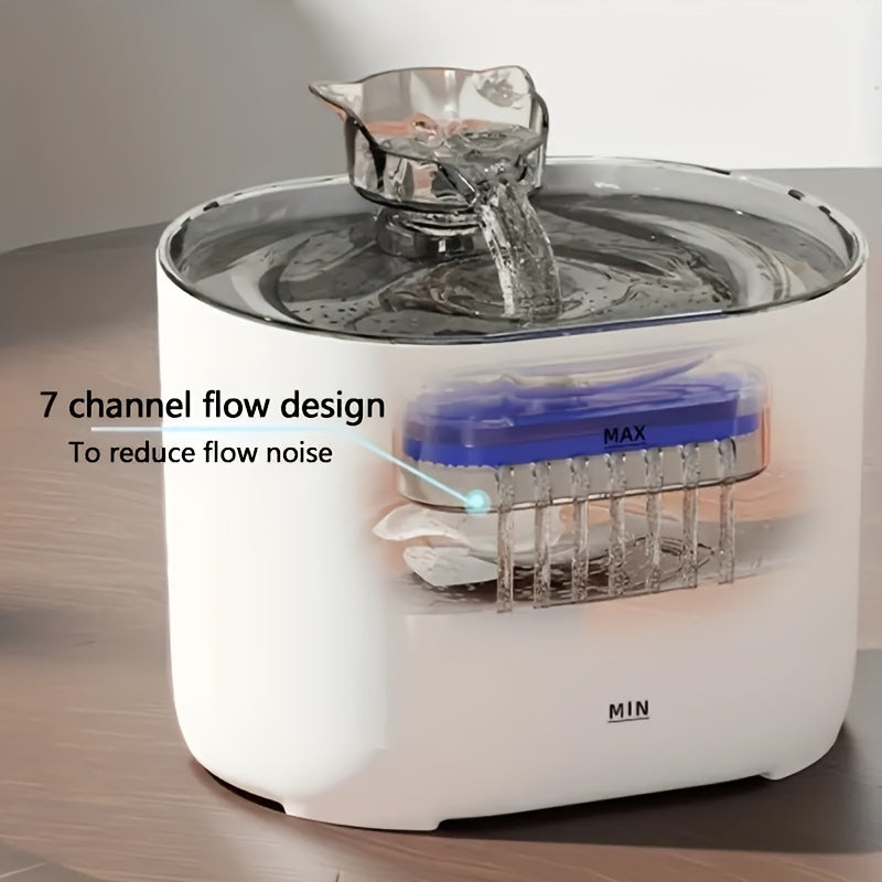 White pet water fountain with clear water flow on a wooden surface