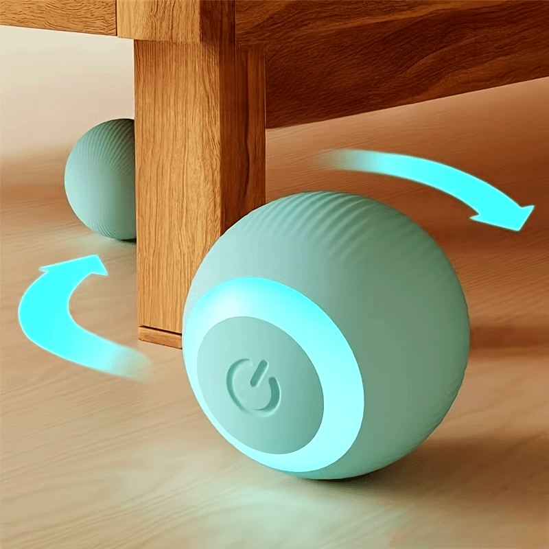 Light blue spherical device with power symbol on a wooden surface